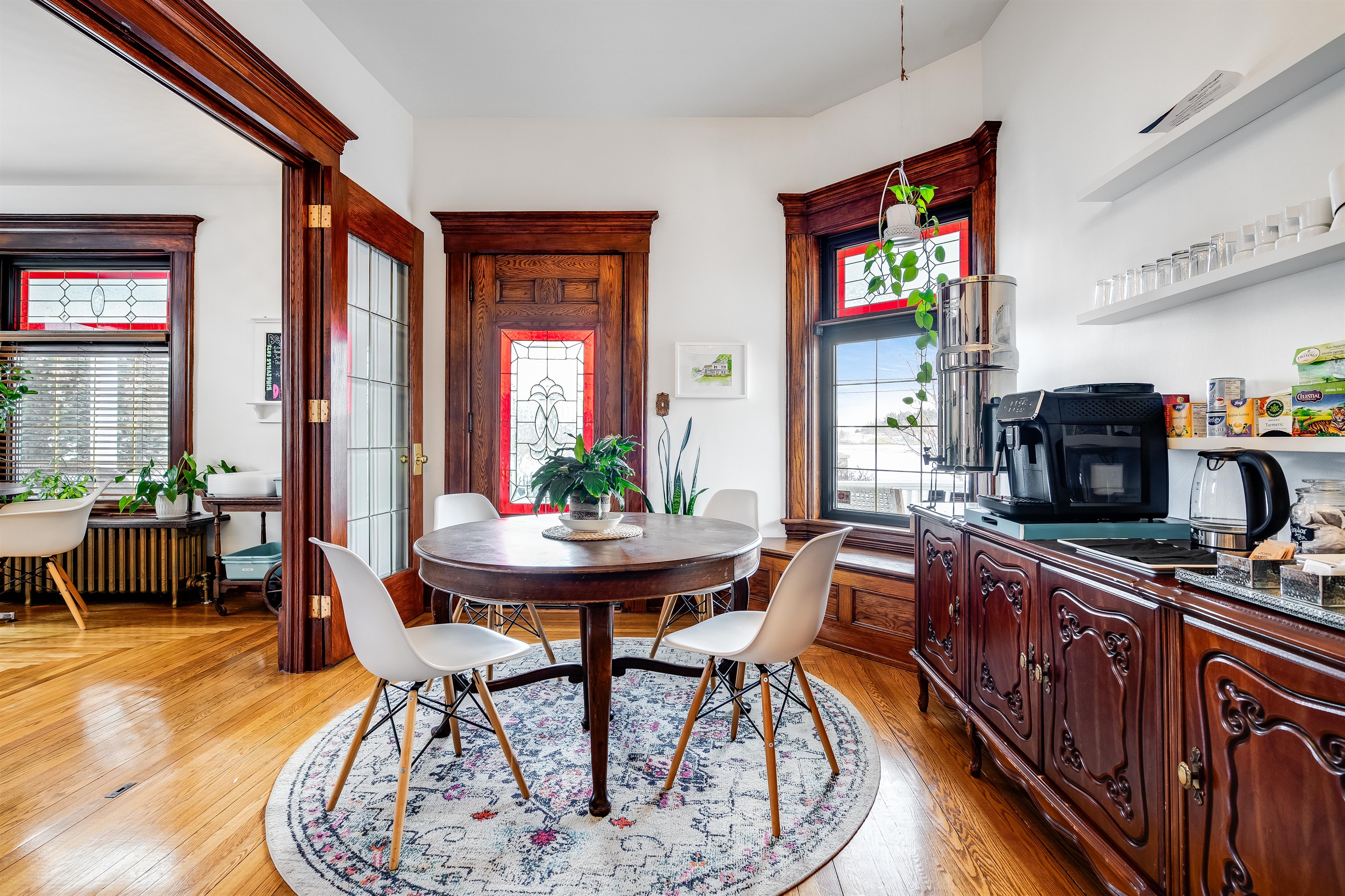 Multiple seating areas in the shared breakfast area.