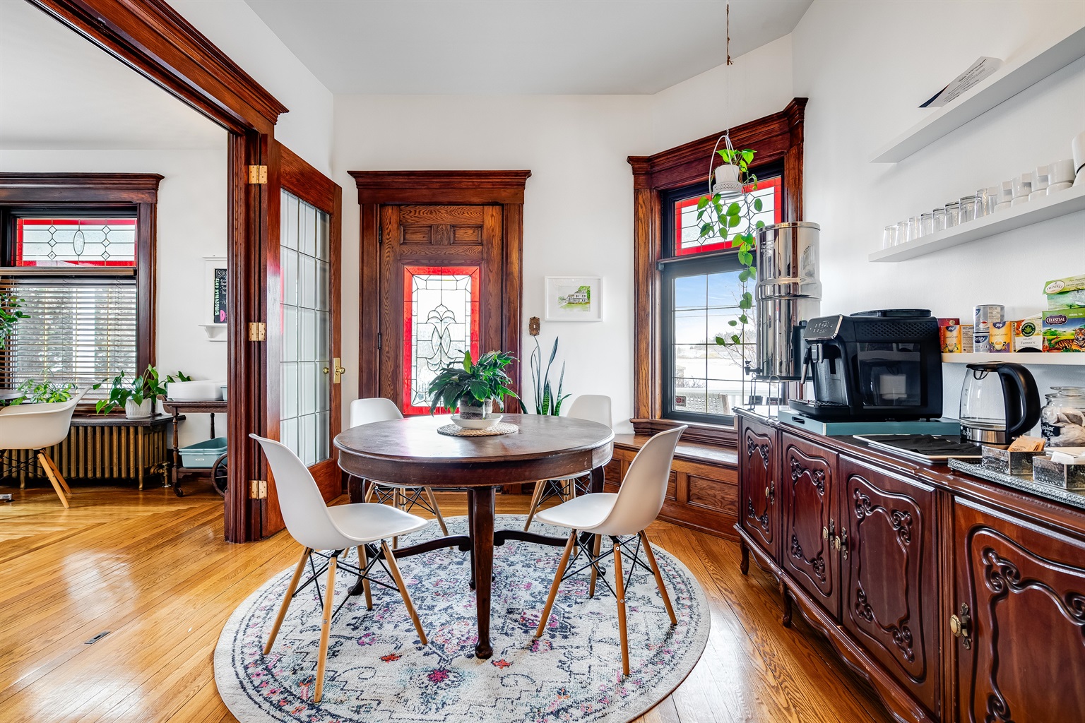 Multiple seating areas in the shared breakfast area.