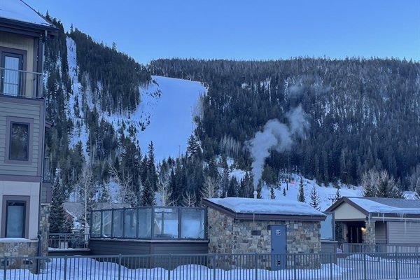 Plaza level overlooking hot tubs, firepit, and ski slopes