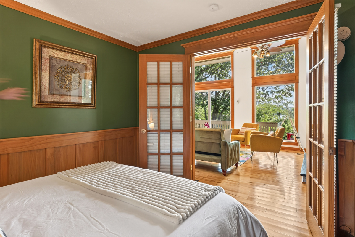Bedroom with French doors leading to the living area