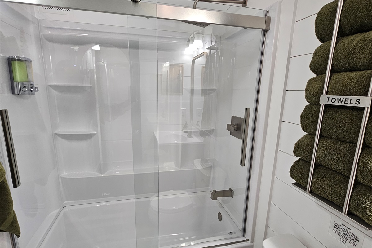 A bright, modern bath for unwinding after forest days