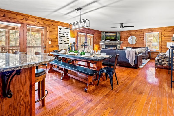 Living Room (Seating for 14- 4 Swivel Bar Stools, 8 ft. Dining table for 10) and sofas and 2 chairs for additional people.