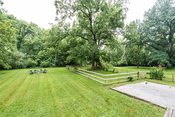 Backyard | grand pecan tree | free driveway parking area for two vehicles
