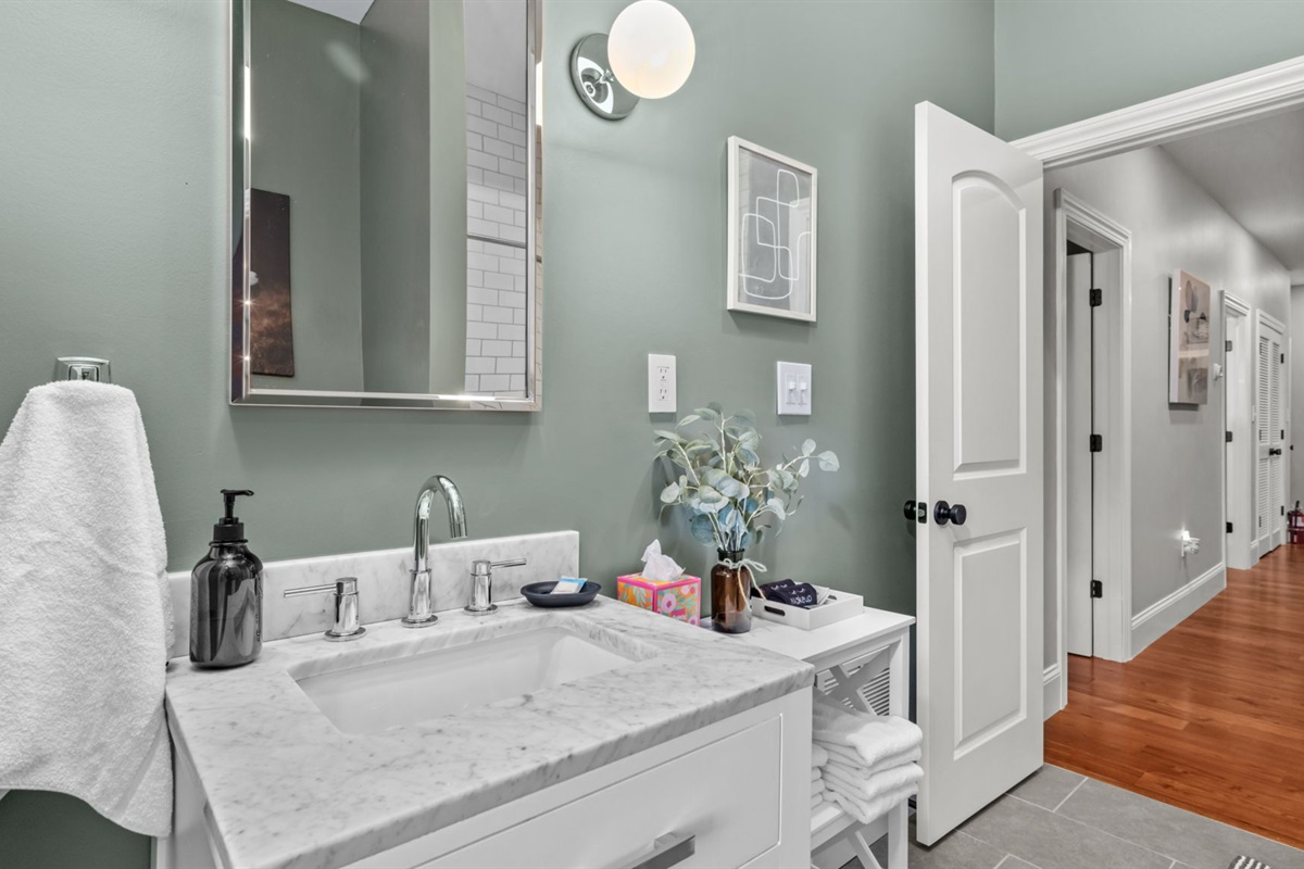 Shared bathroom conveniently located at the end of the hall on the second level.