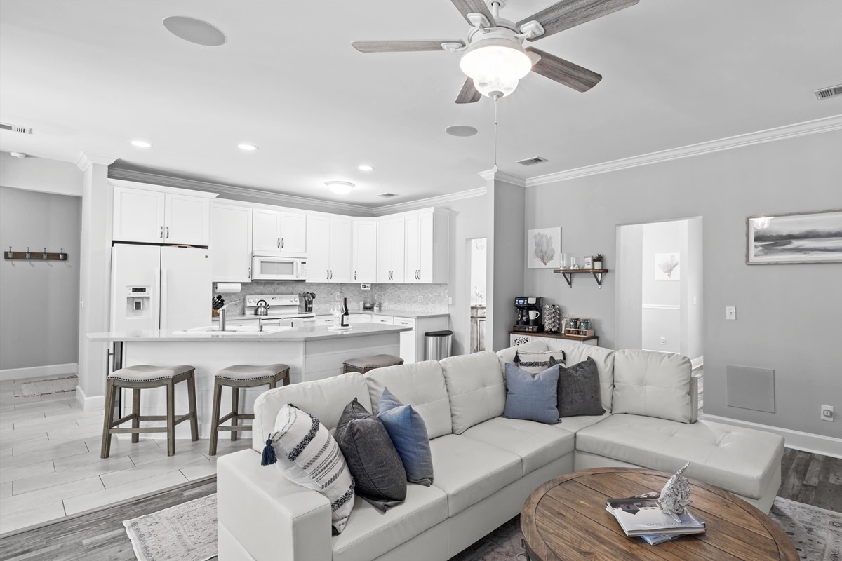 Kick off your shoes and get comfy — this breezy, coastal-inspired living space was made for laid-back moments.