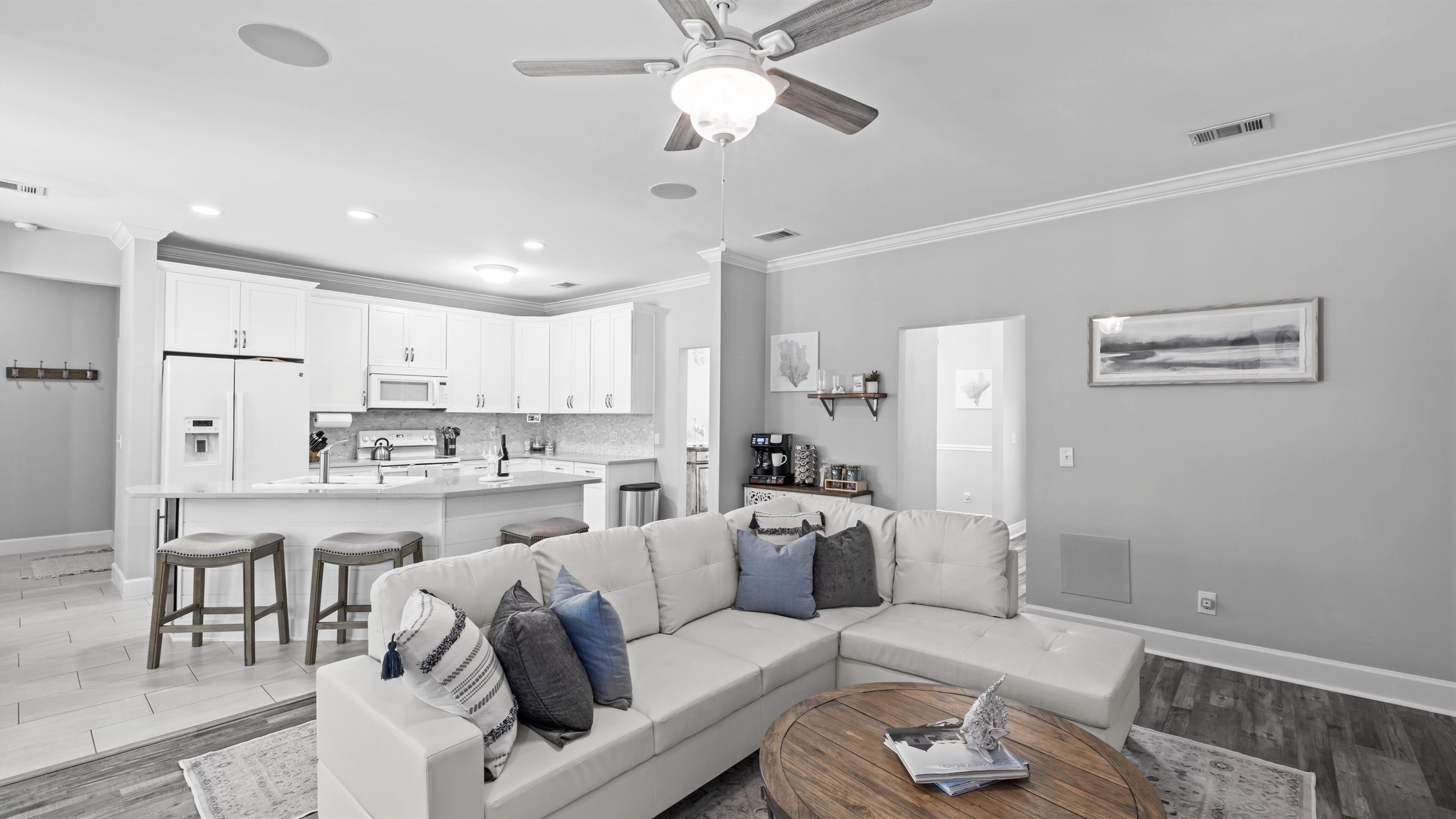 Kick off your shoes and get comfy — this breezy, coastal-inspired living space was made for laid-back moments.