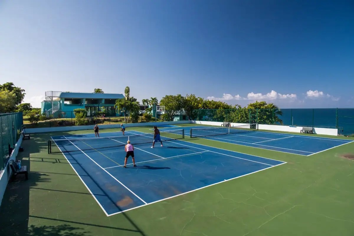 Tennis court ready for a friendly match under the island sun.