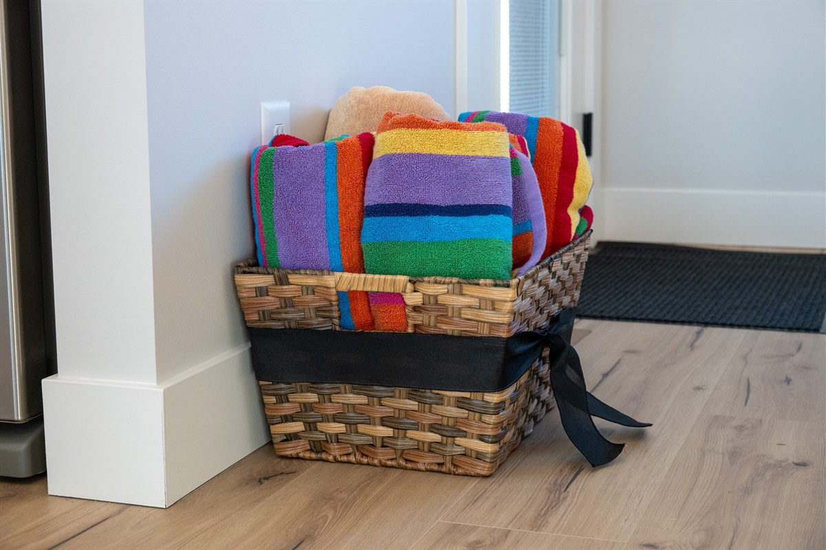 Colorful pool towels ready for hot tub relaxation.