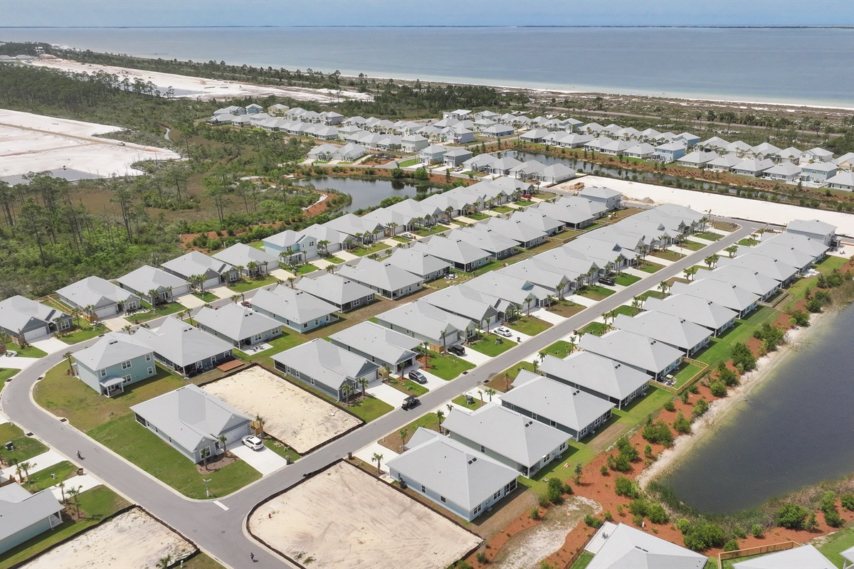 Aerial view of the area, close proximity to community pool and beach access