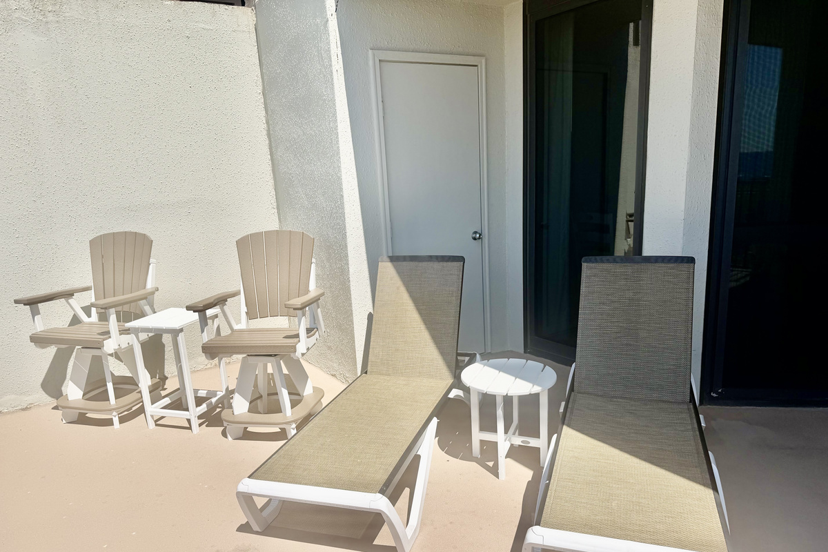 2 chaise loungers and 2 adirondack chairs on this side of the balcony!