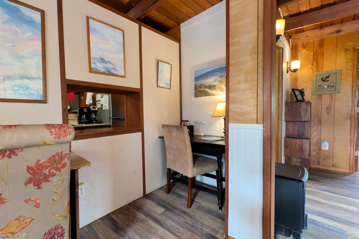desk tucked into nook in dining room