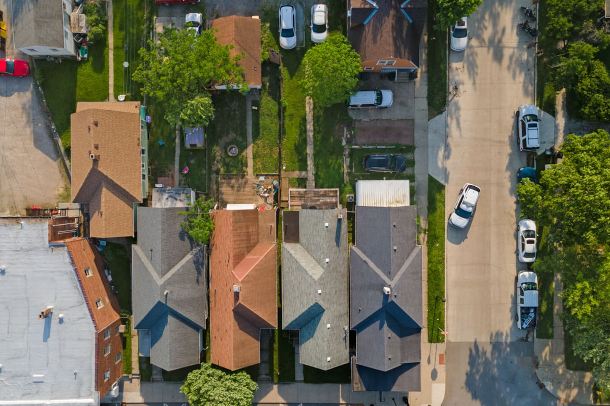 A bird's eye view reveals a charming property surrounded by scenic beauty