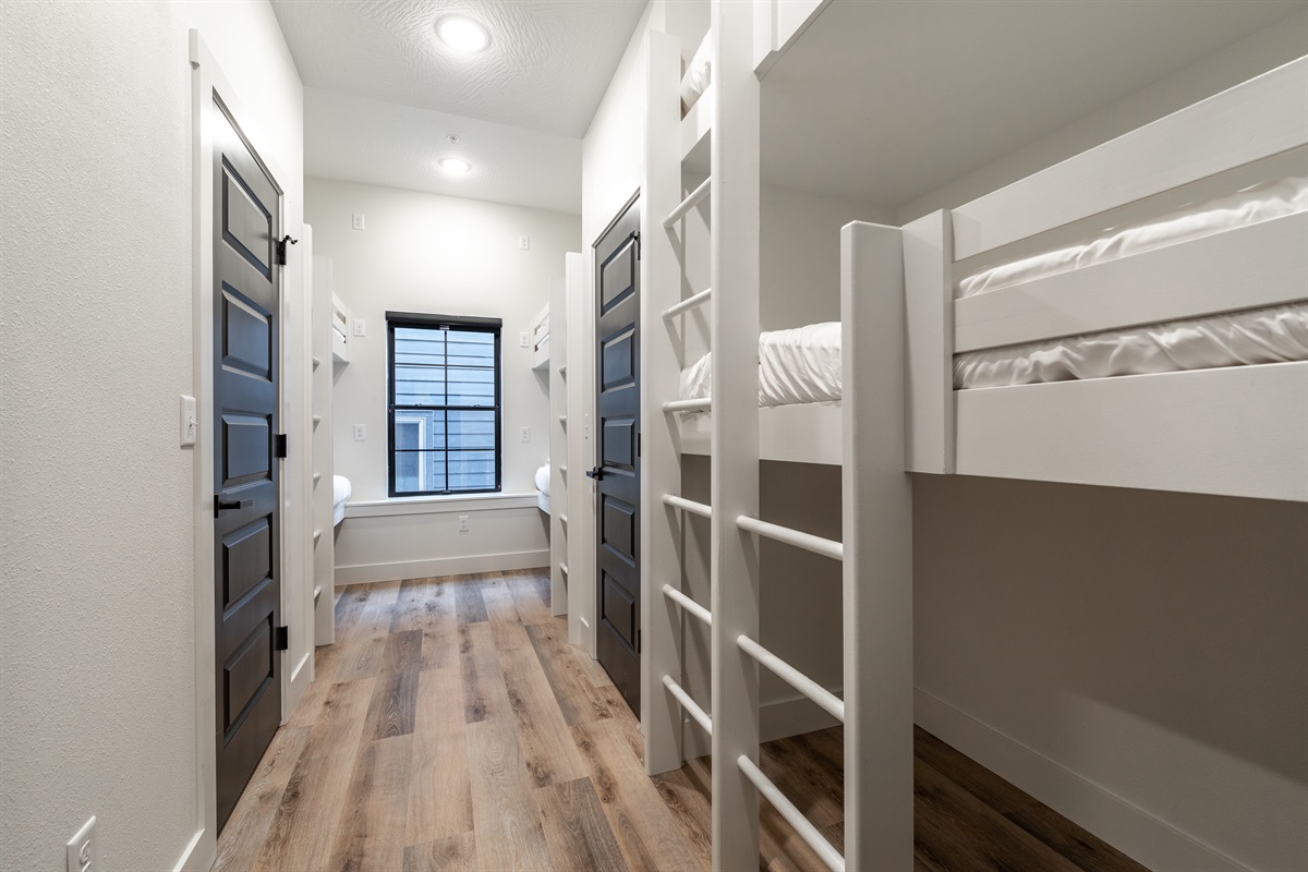 Lower level bunk room w/ 6 twin beds and ensuite bath