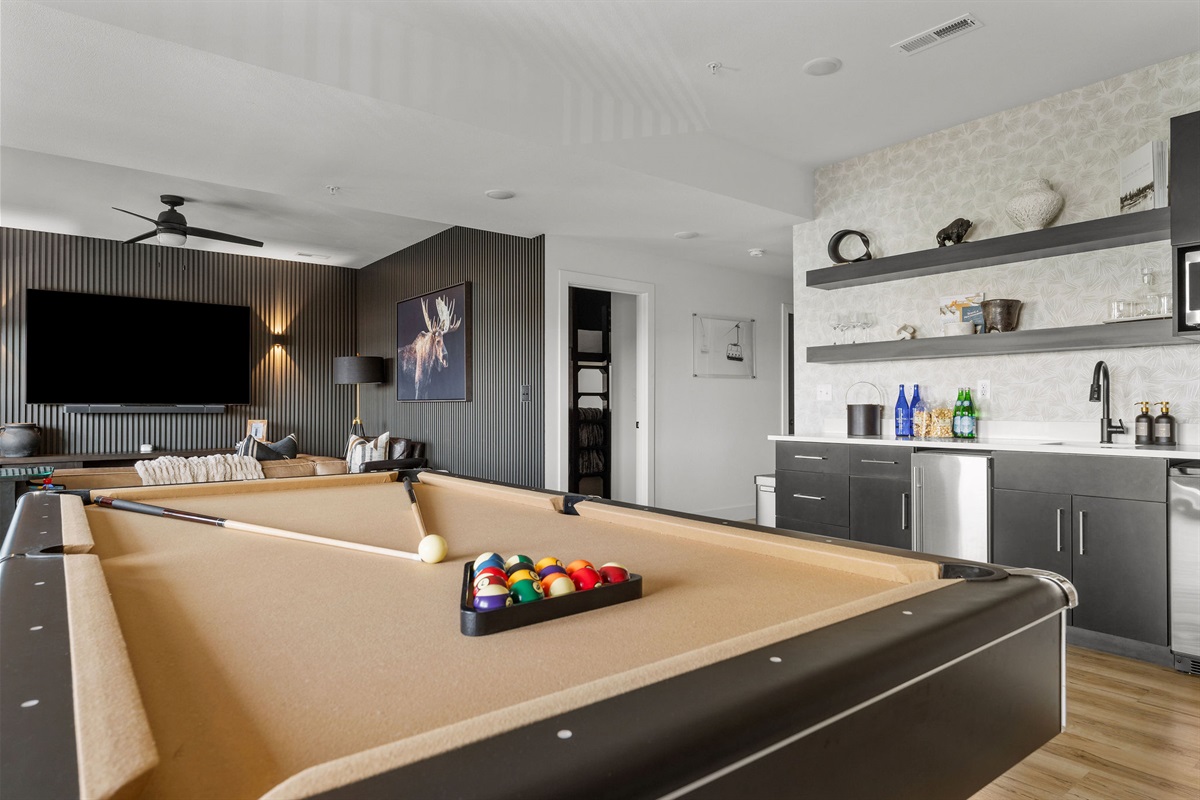 Challenge your family to a game of pool or games on the PS5!