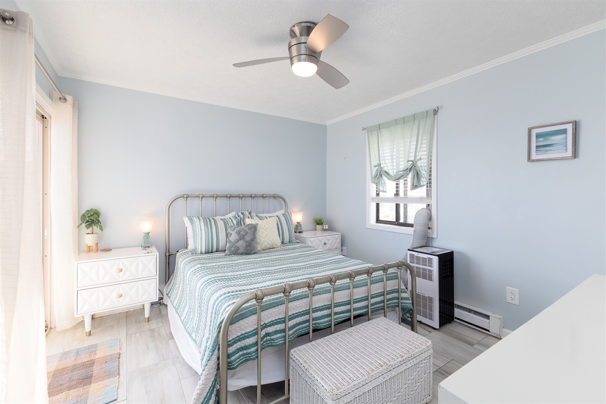 Queen-size bed in the primary bedroom