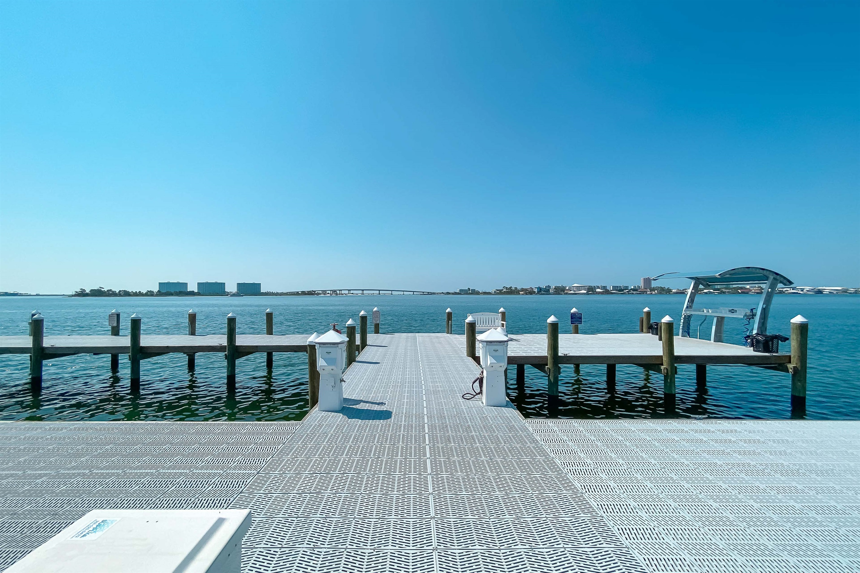 Your paradise awaits. Wake up to panoramic bay views and spend your days enjoying the sun from your private dock. This is more than a home; it's a a permanent vacation.