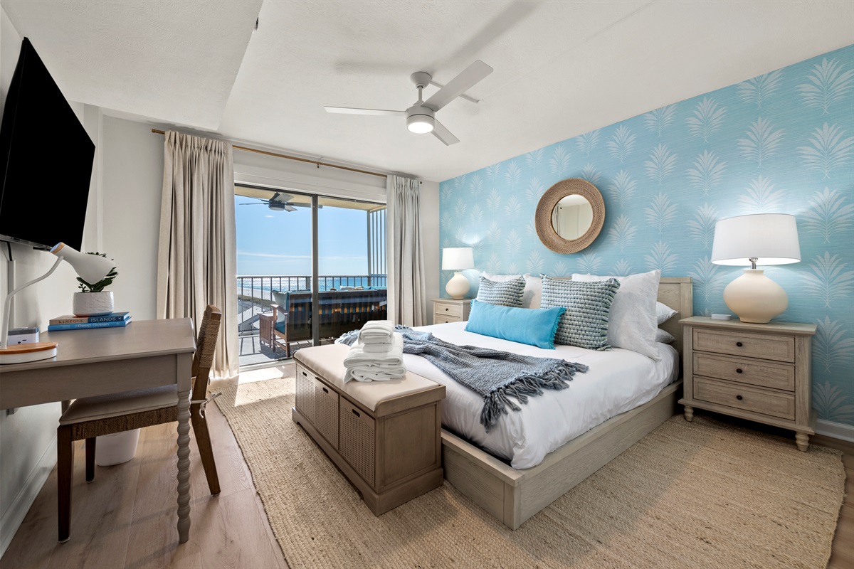 Relax in style with coastal textures, calming tones, and seamless access to your private balcony escape.