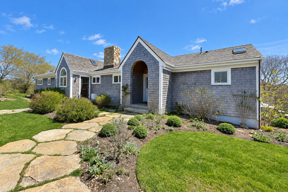Front of the home and gardens