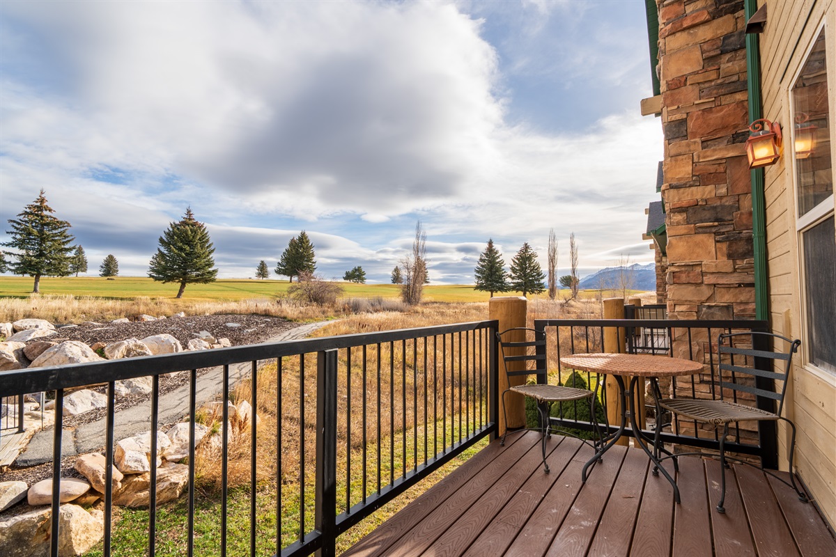 Accessed from the sitting area, offering peaceful outdoor seating and scenic views.