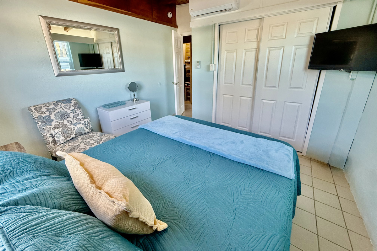 Bright and coastal Queen bedroom