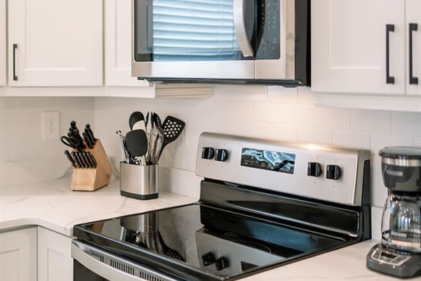Thoughtfully designed kitchen featuring generous counter space and updated finishes.