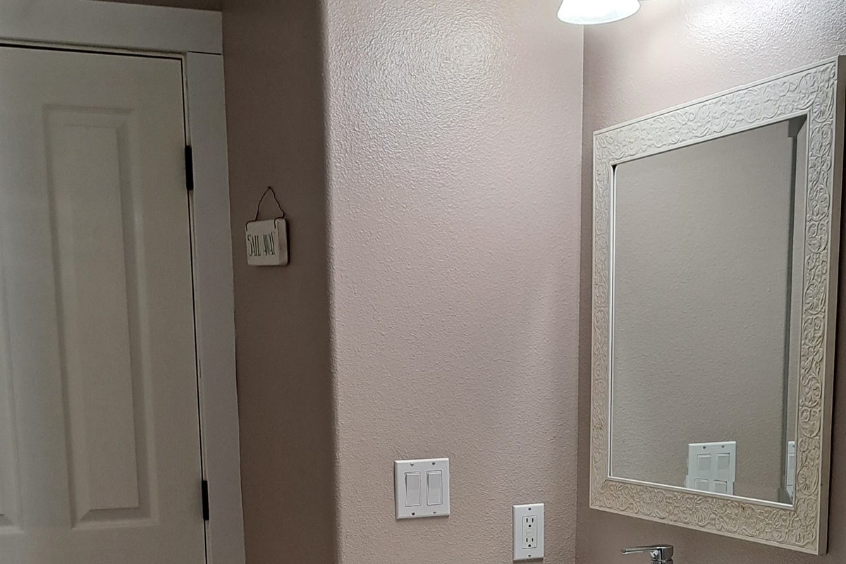 Full bathroom with a soaking tub.