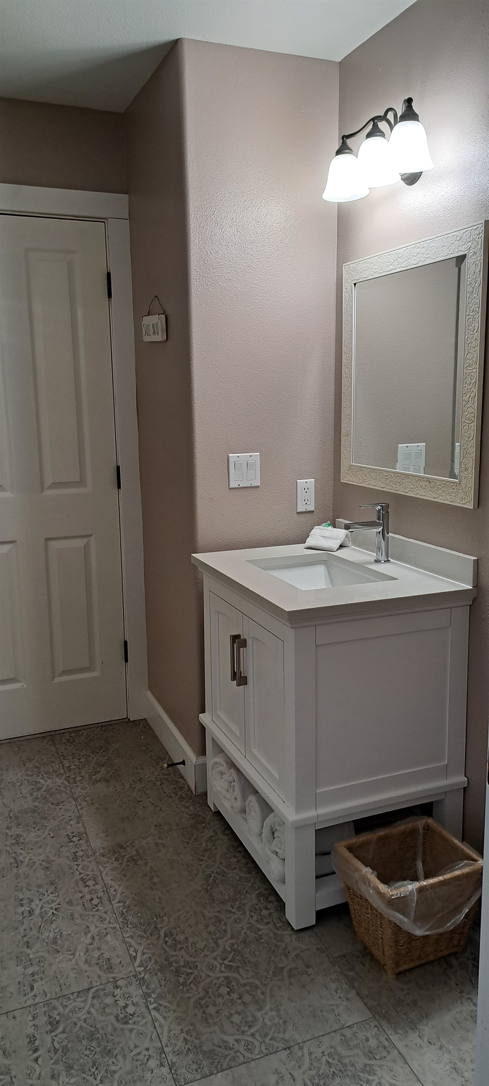 Full bathroom with a soaking tub.