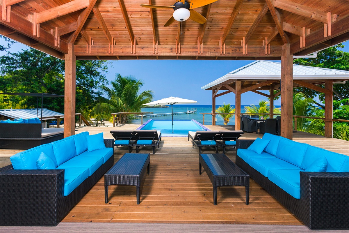 Whether you’re a sun seeker or a shade dweller, we’ve got you covered. Relax with ample poolside seating—choose a lounger in the bright island sun or retreat to the cool, breezy shade of our covered terrace. ☀️🌴⛱️