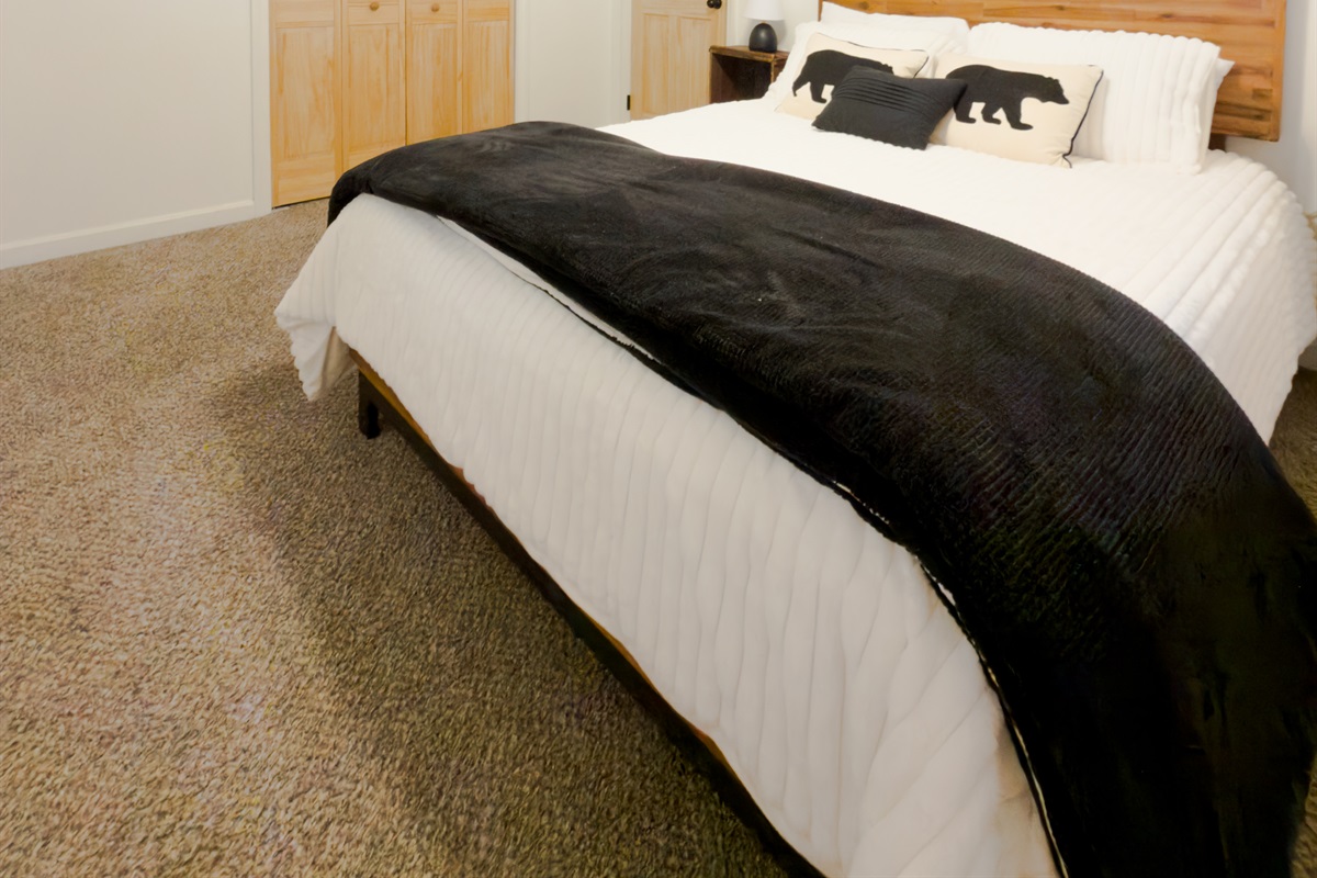 Bedroom 2 - Queen. Enjoy snuggling in while at the chalet. 