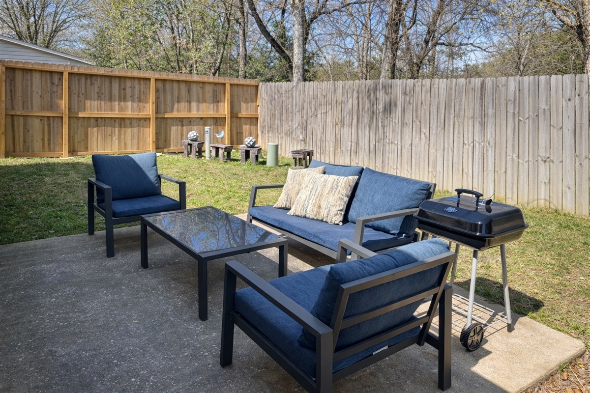 Spacious outdoor area for BBQs, games, and relaxation.