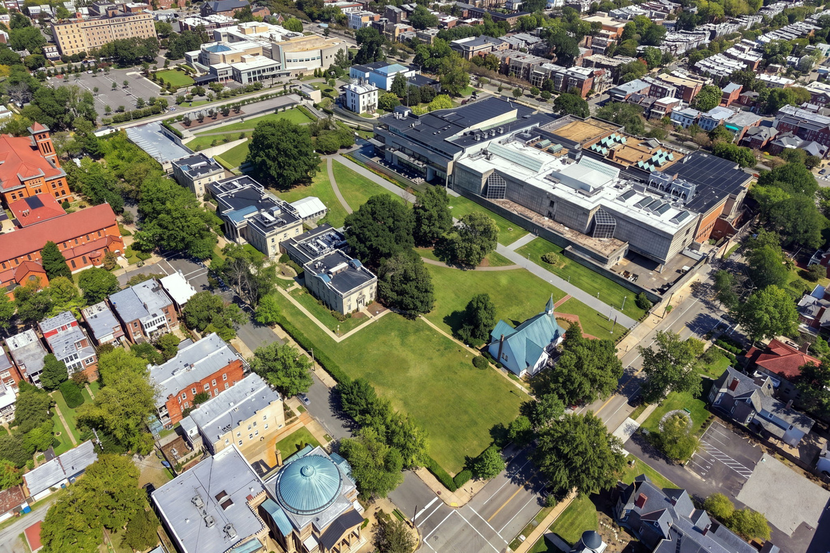 Aerial View: Discover vibrant Richmond from above, surrounded by lush greenery and historic charm!