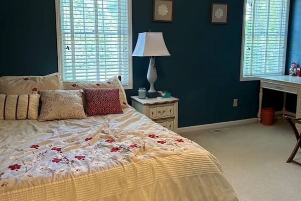 Bedroom #4. New Queen sized bed with mattress topper.