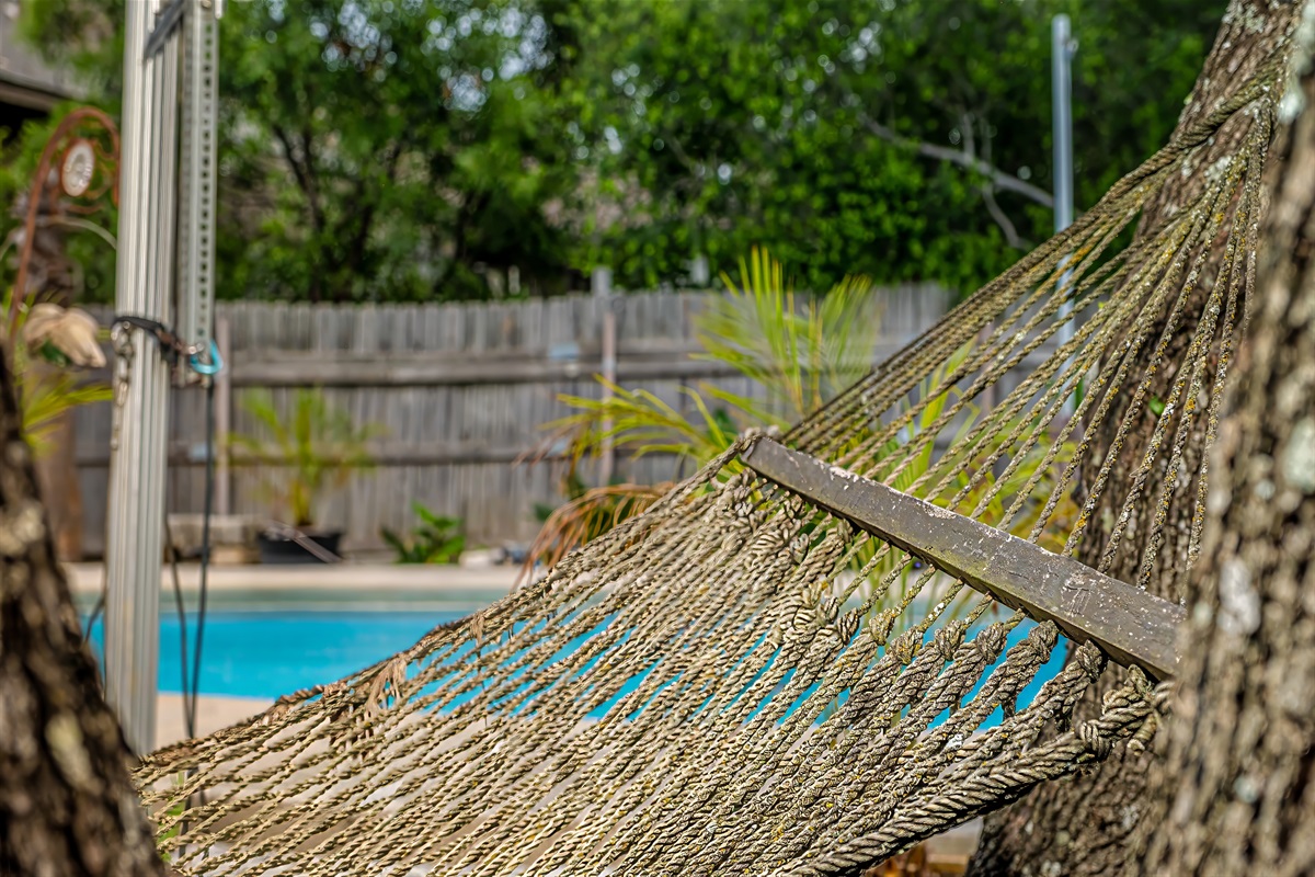 Naturally shaded patio made of Texas limestone that stays cool on hot summer days.