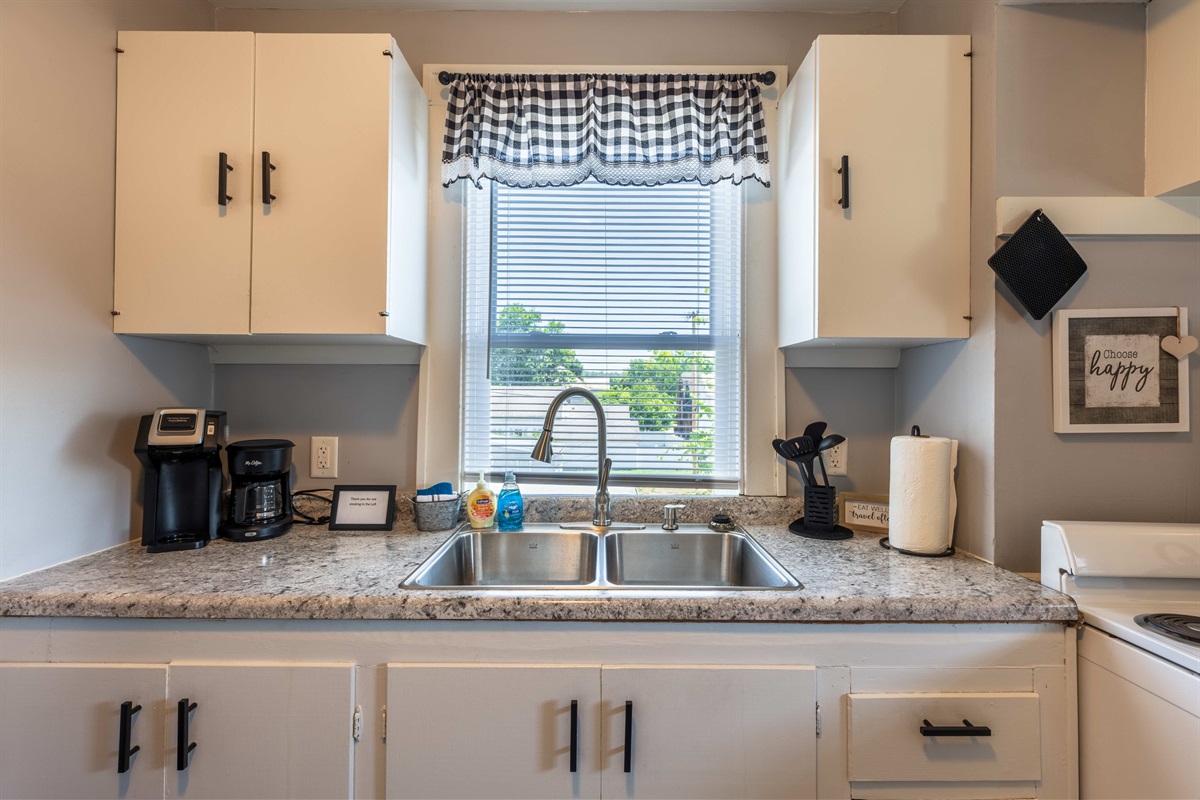 Some natural lighting coming into the kitchen. We have both a k-cup style and original style coffee makers.