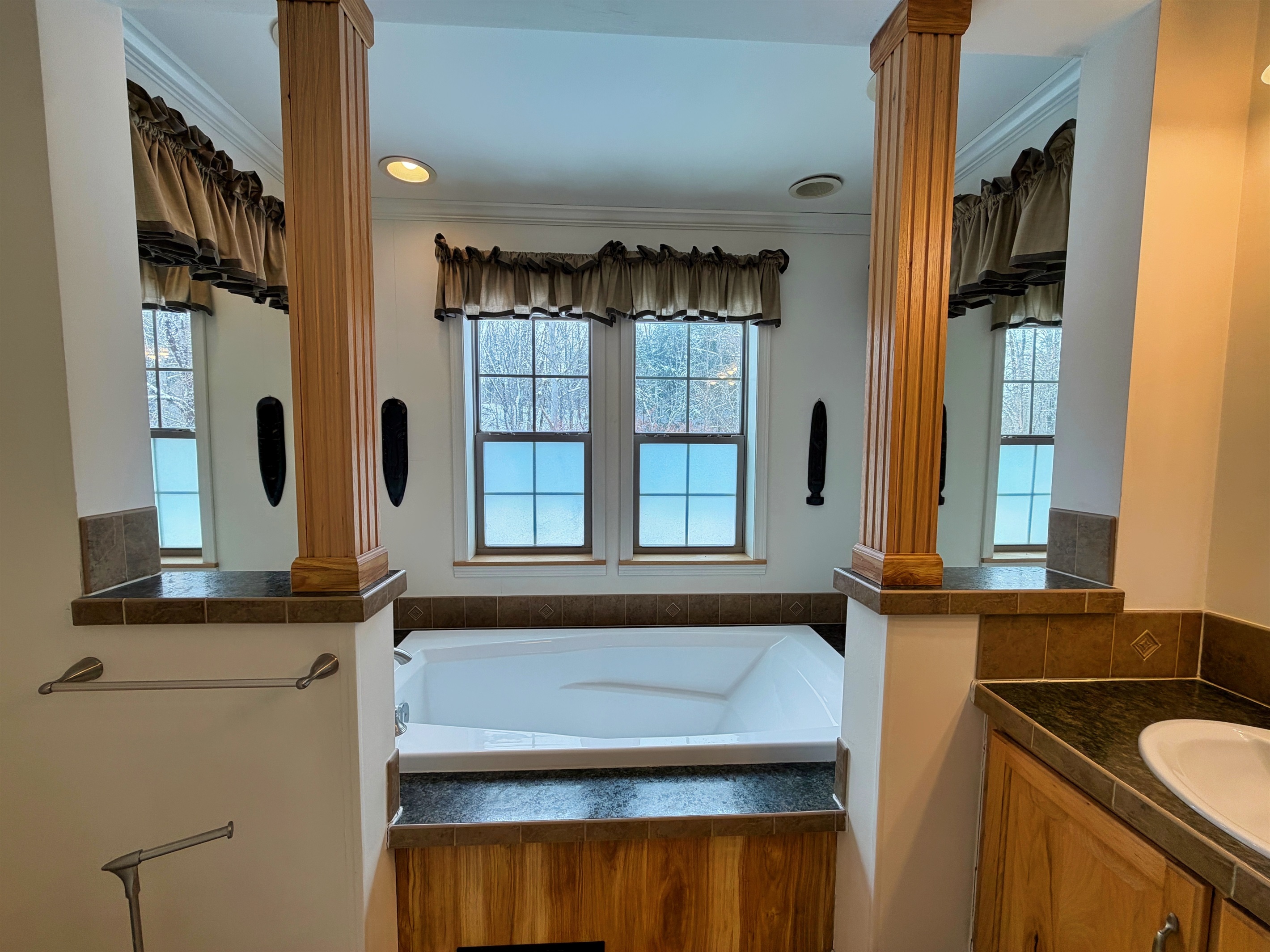 Primary bathroom with jetted tub and shower.