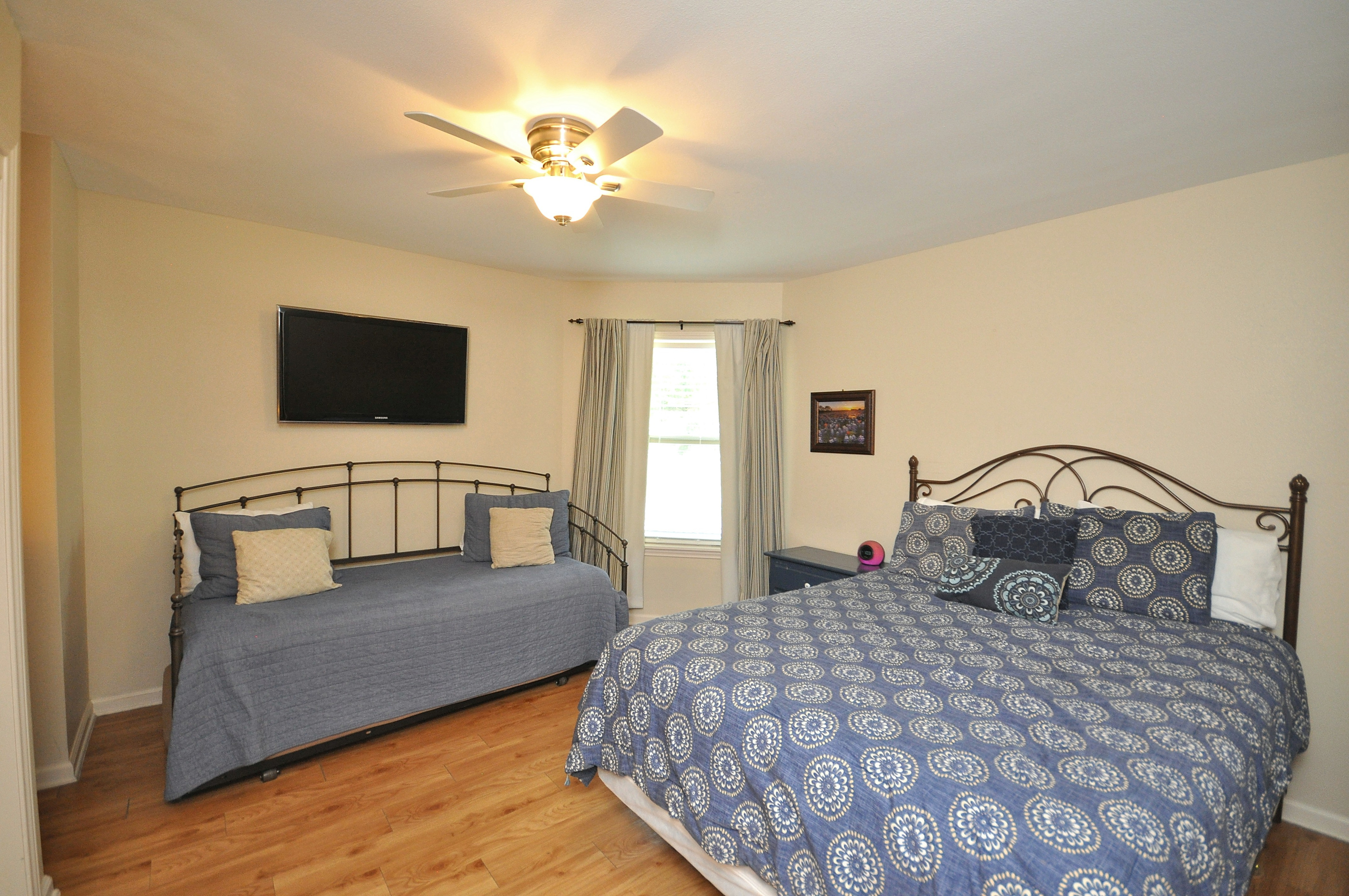 Large bedroom with flexible sleeping arrangements.