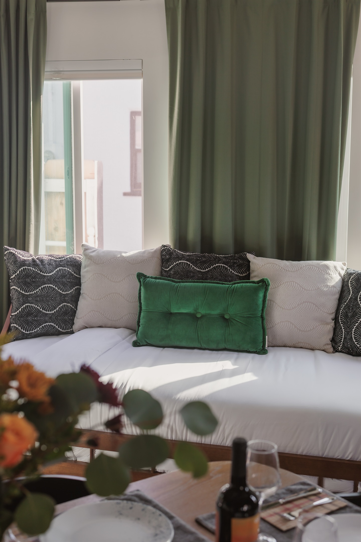 Daybed Nook: Bright space with plush pillows and inviting light, perfect for lazy afternoons!