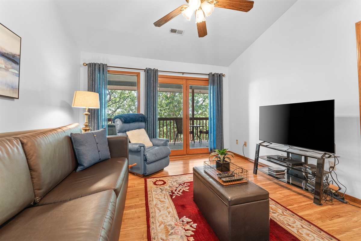 Kick back with a movie, open the curtains, or head outside for evening air on the deck.