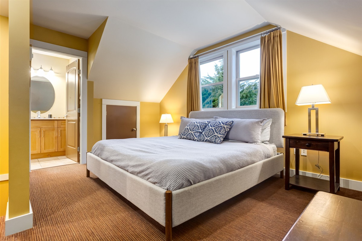 Cozy king bed in loft