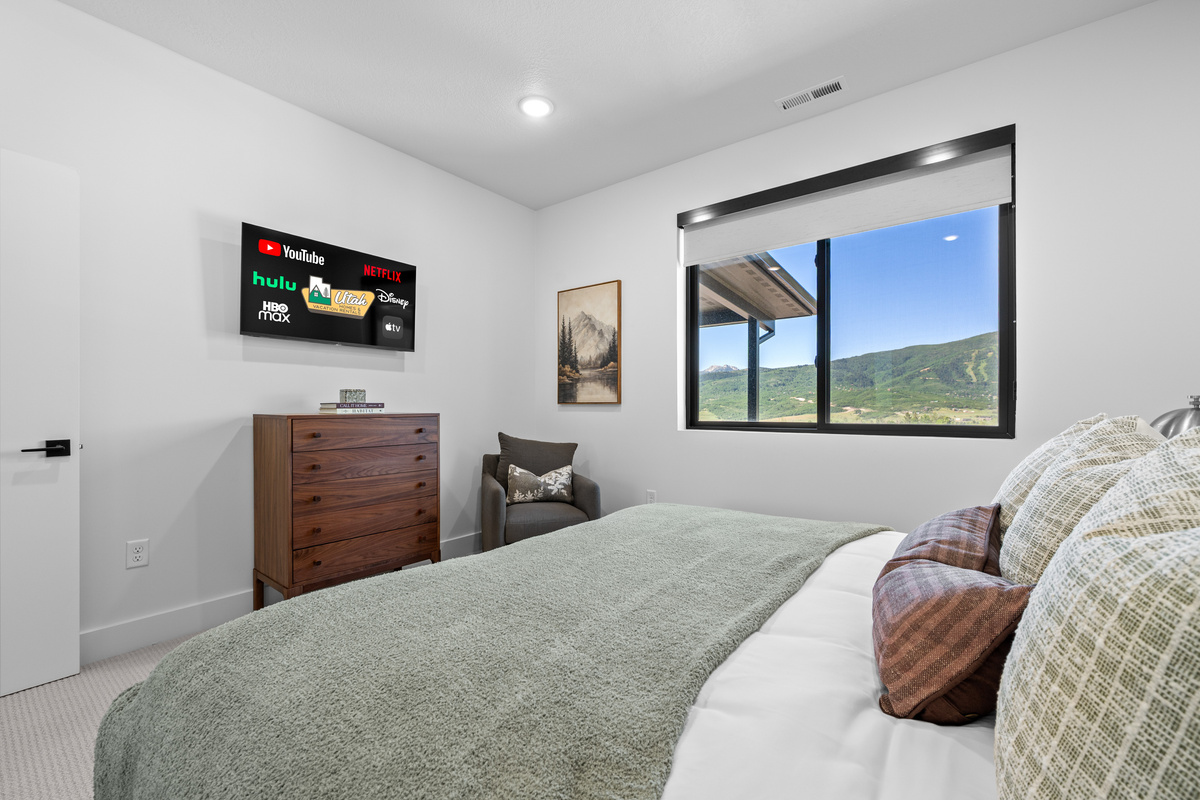 Wake up to beautiful mountain scenery from the comfort of your bed.