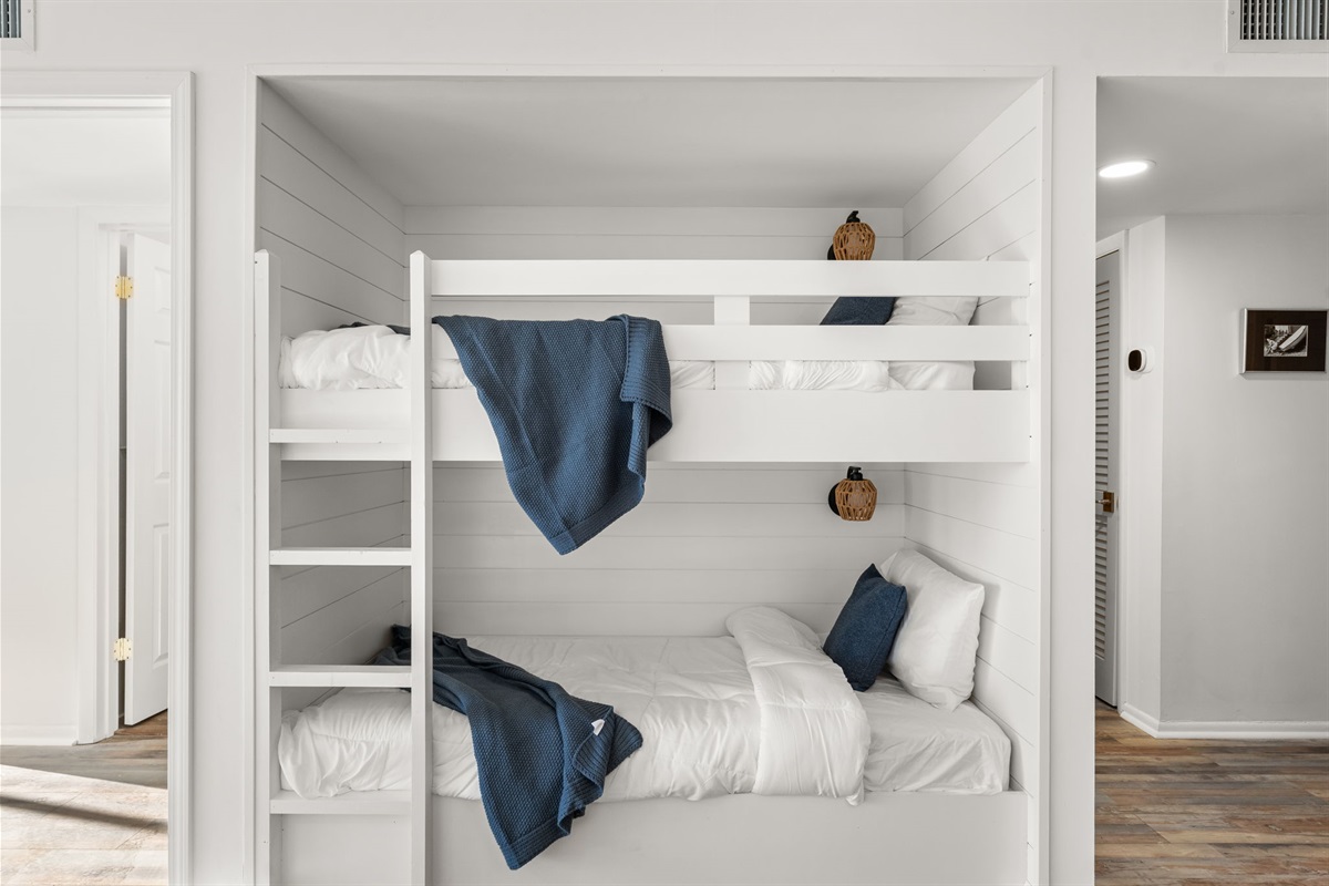 The built in bunks have memory foam mattresses and the same high count luxury linen as the two bedrooms