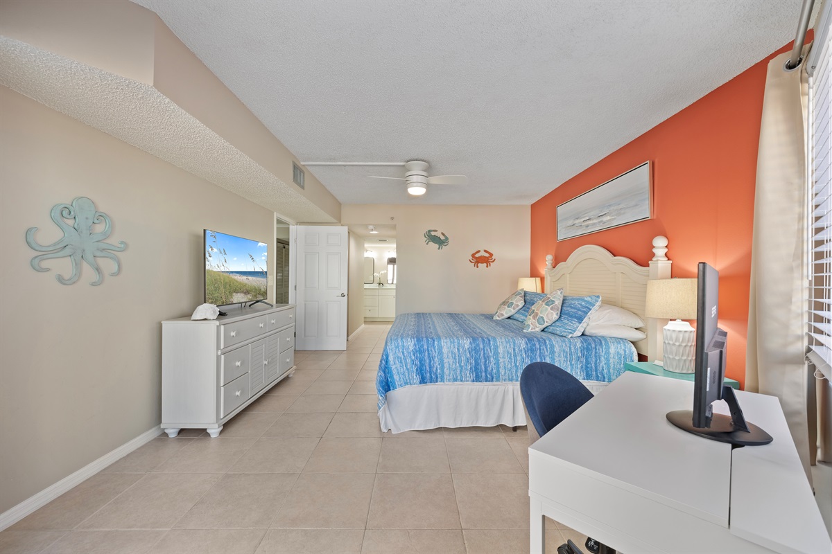 King size master bedroom with pool/gulf views and patio access.