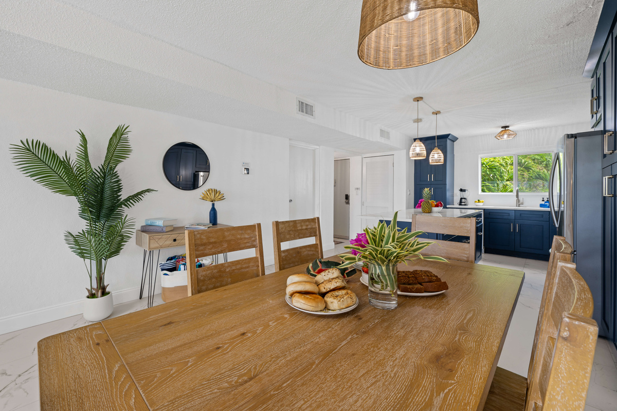 Comfortably seating six, this inviting dining space is perfect for family dinners or game nights.