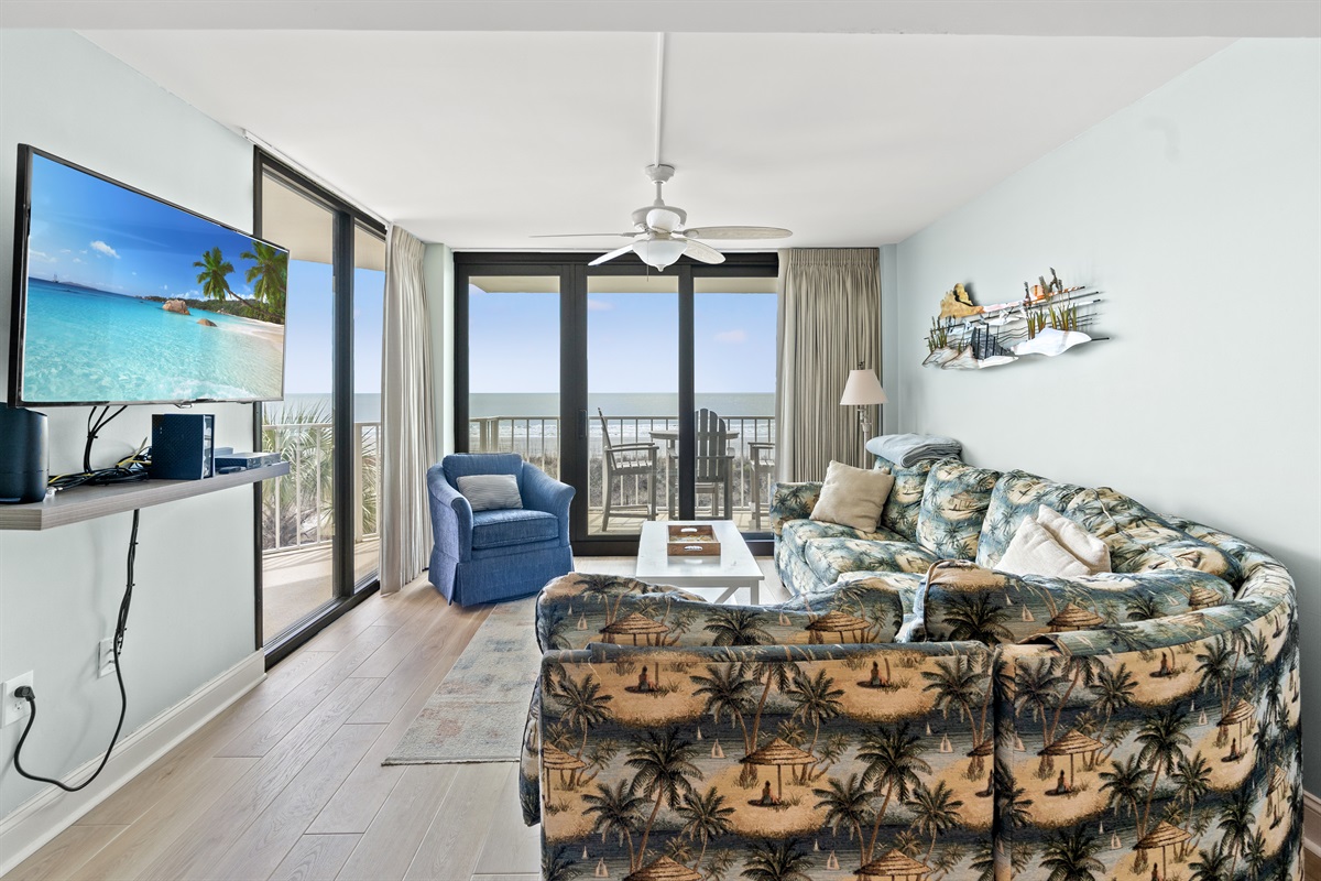 Spacious Living Room with oceanfront views and balcony