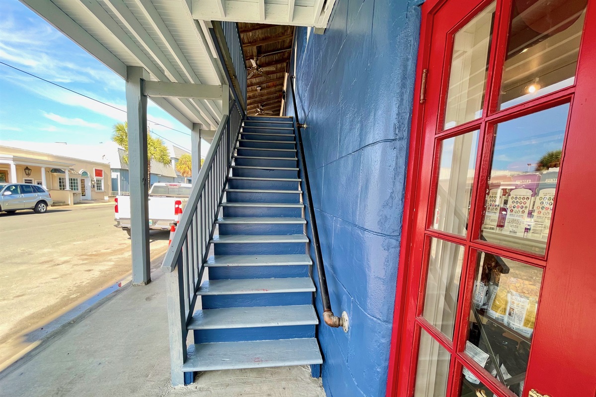 Side stairs of building leading up to apartments