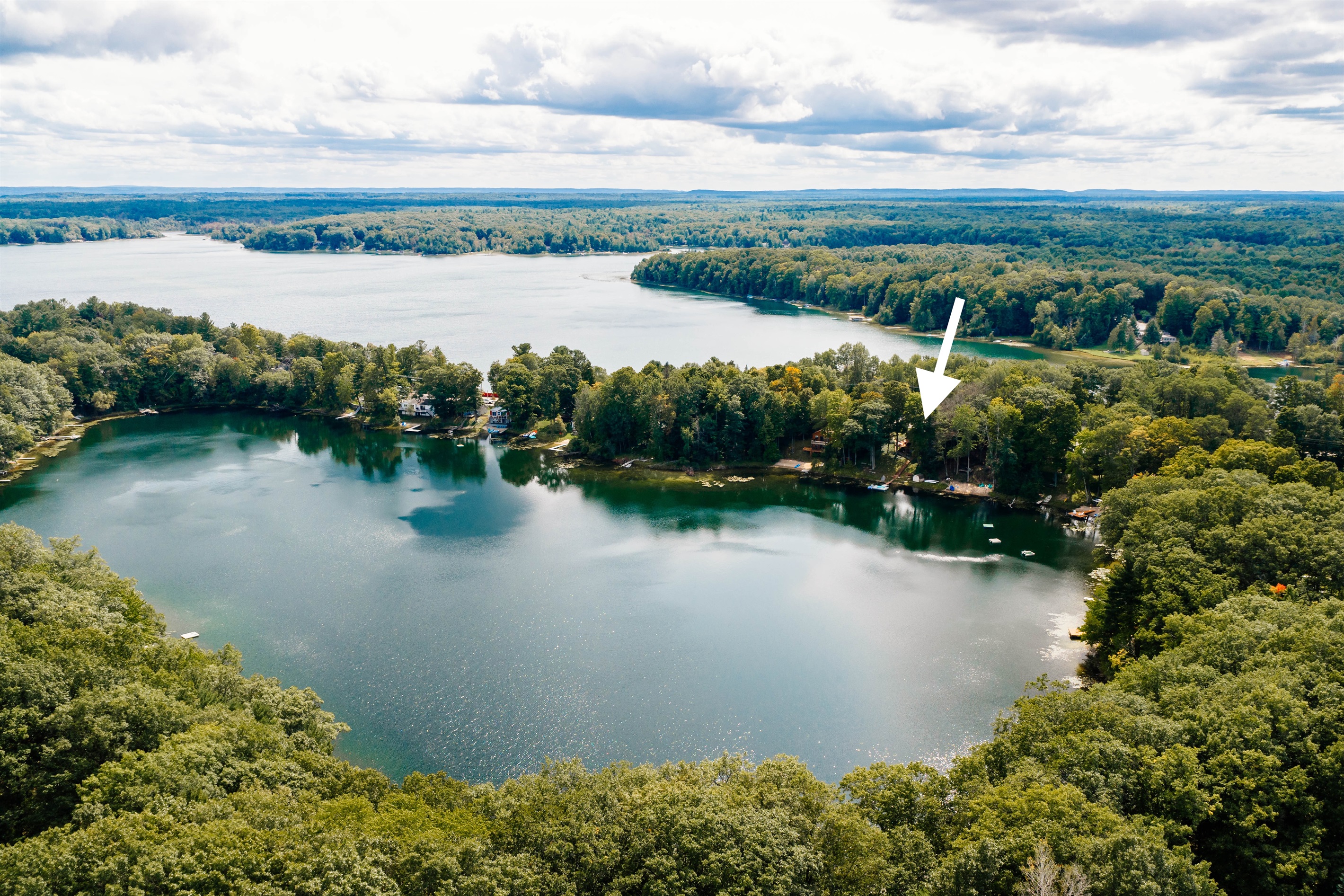 Aerial view of Lake Ann with the home’s location highlighted