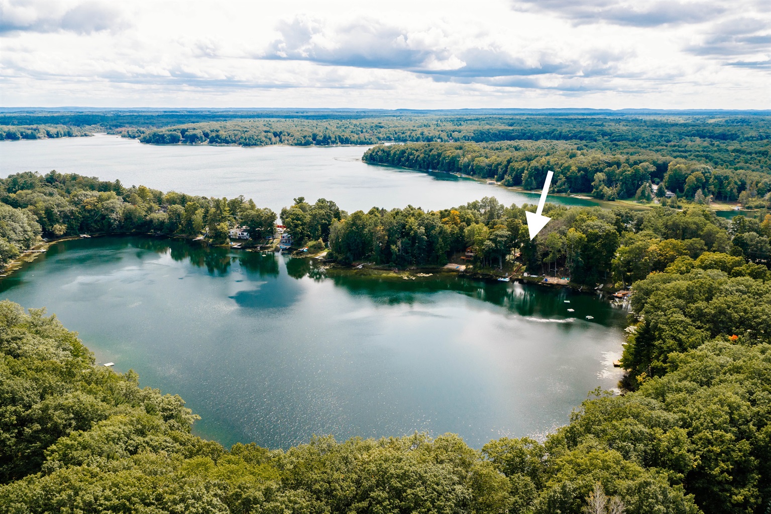 Aerial view of Lake Ann with the home’s location highlighted