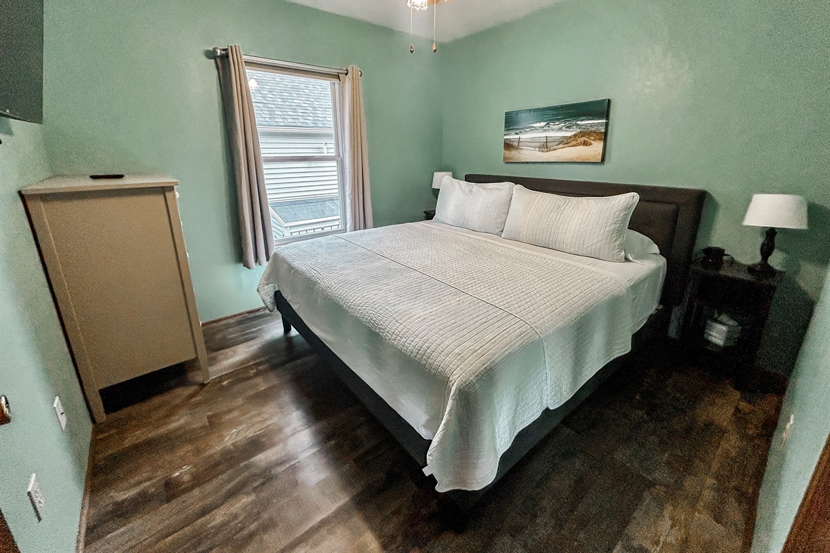 [Bedroom #2] King bed with TV.