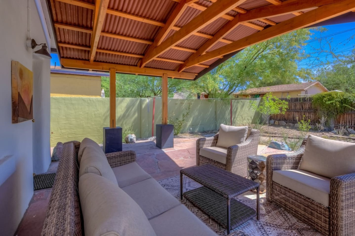 Nice back patio with flagstone and mature plantings