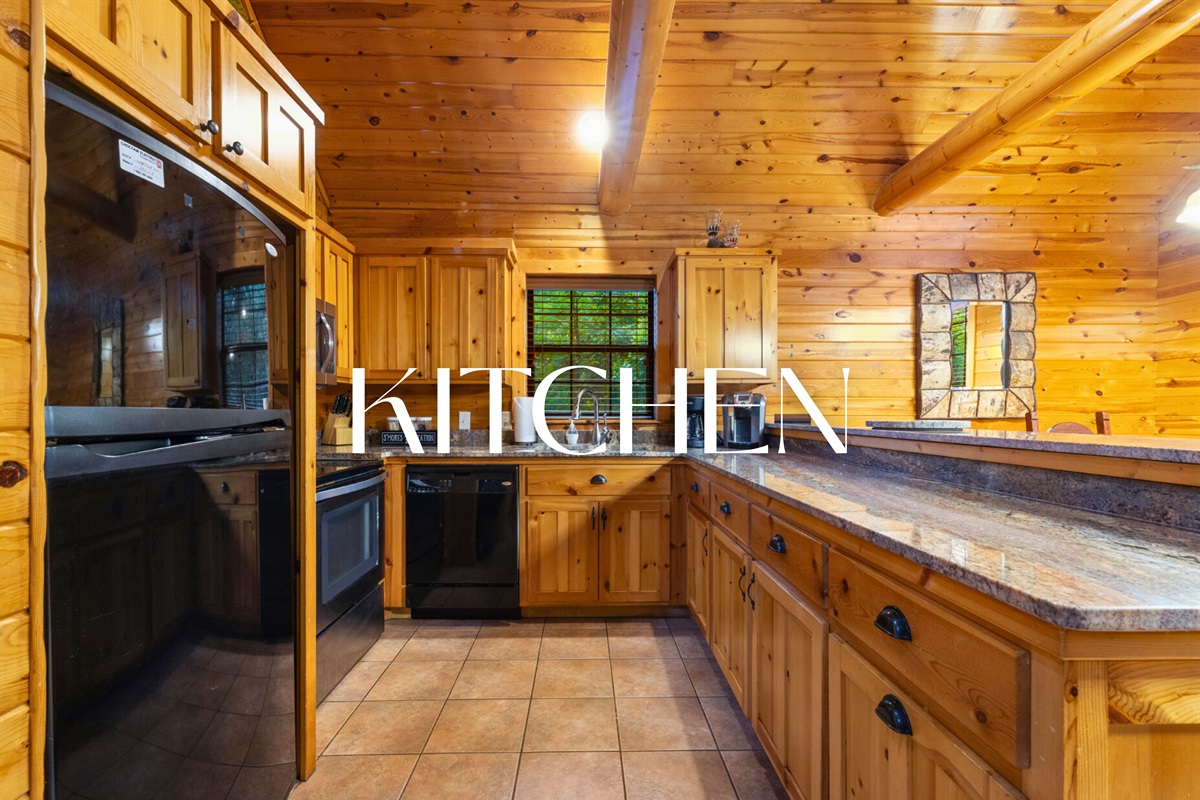 Kitchen with plenty of space and rustic wood accents.